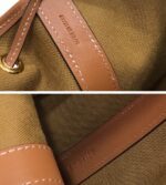 small drawstring bag in triomphe canvas and calfskin (8)