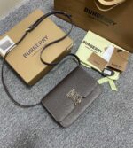 small topstitched grainy leather tb bag (1)